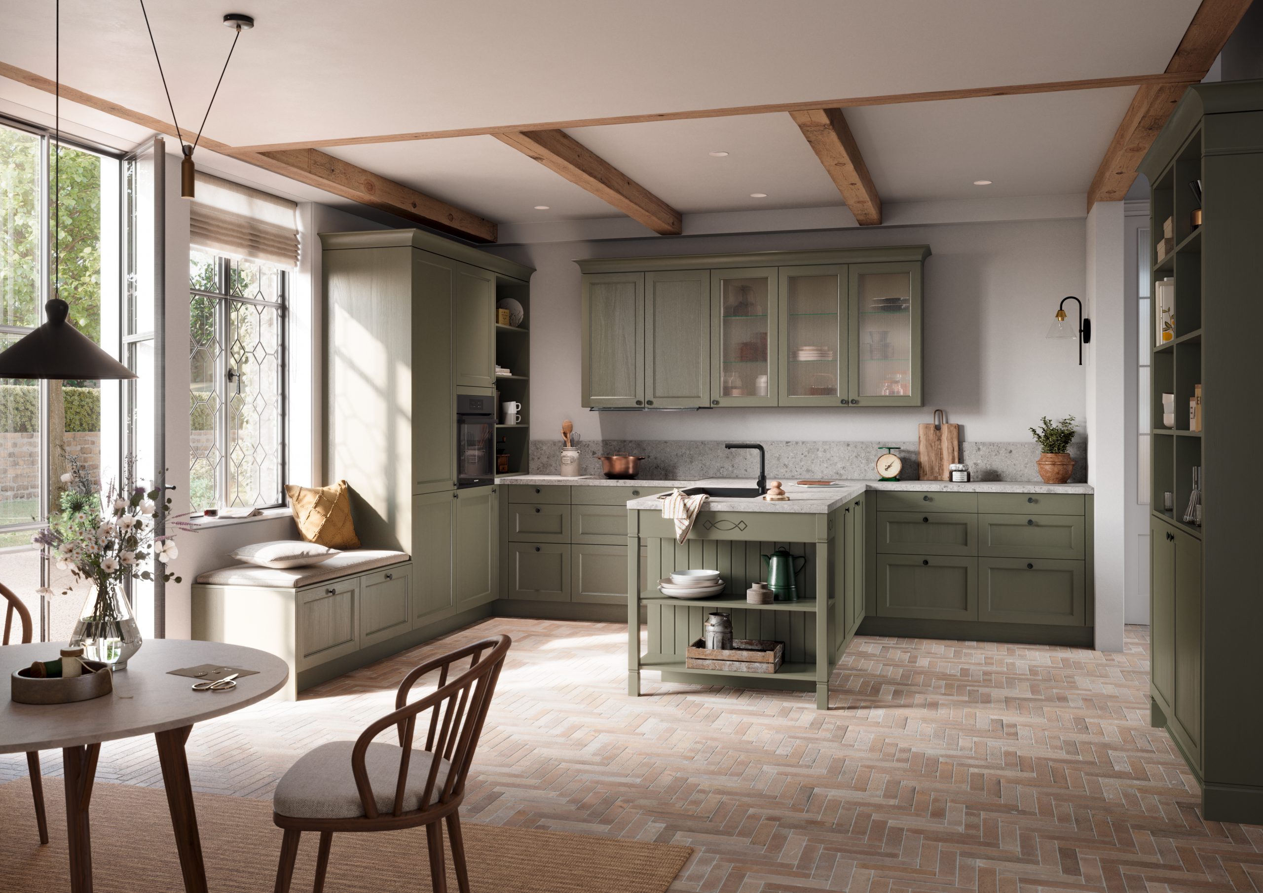 Green shaker kitchen with glazed cabinetry and a built-in window seat
